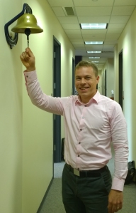Ringing the "I got a Job" bell in the ND MBA office after accepting my offer to join enFocus.